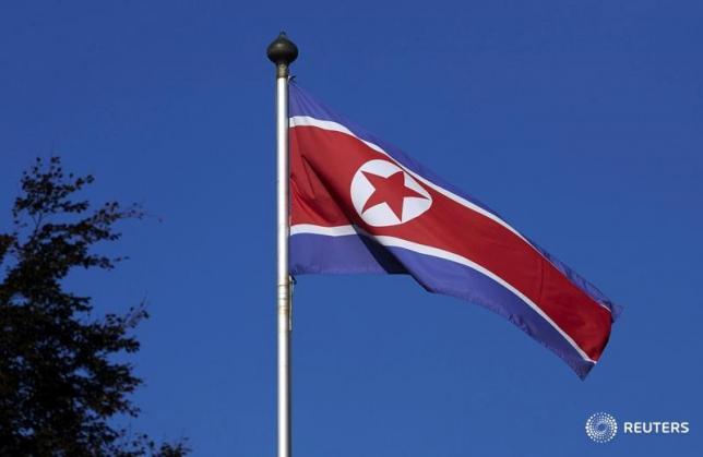 A North Korean flag flies on a mast at the Permanent Mission of North Korea in Geneva October 2, 2014.   REUTERS/Denis Balibouse/File Photo