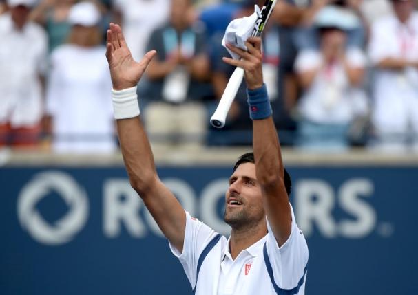 Jul 27, 2016; Toronto, Ontario, Canada;   Novak Djokovic of Serbia salutes fans after winning his match against  Gilles Muller of Luxembourg  on day three of the Rogers Cup tennis tournament at Aviva Centre. Dan Hamilton-USA TODAY Sports