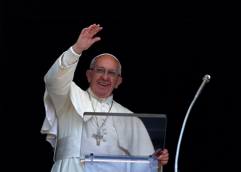 Pope Francis waves during his Sunday Angelus prayer in Saint Peter's square at the Vatican City on Sunday, July 3, 2016. Photo: Reuters