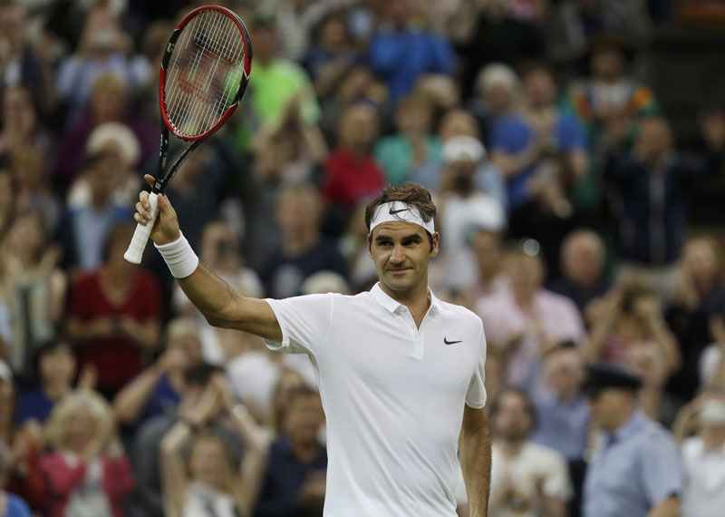 Roger Federer celebrates winning his match against Great Britain's Daniel Evans on July 1, 2016. Photo: Reuters/File