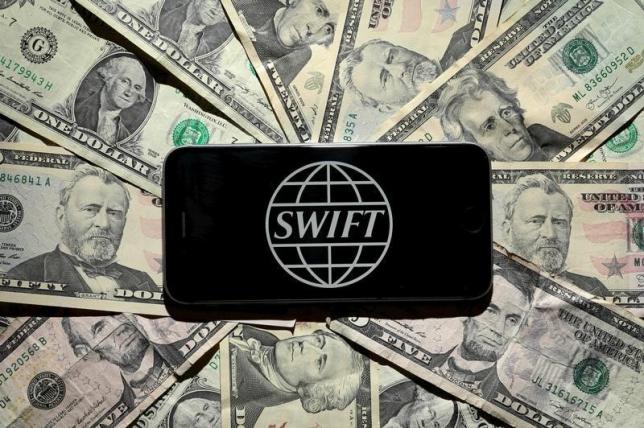 The Swift bank logo is pictured in this photo illustration taken April 26, 2016. REUTERS/Carlo Allegri/File Photo