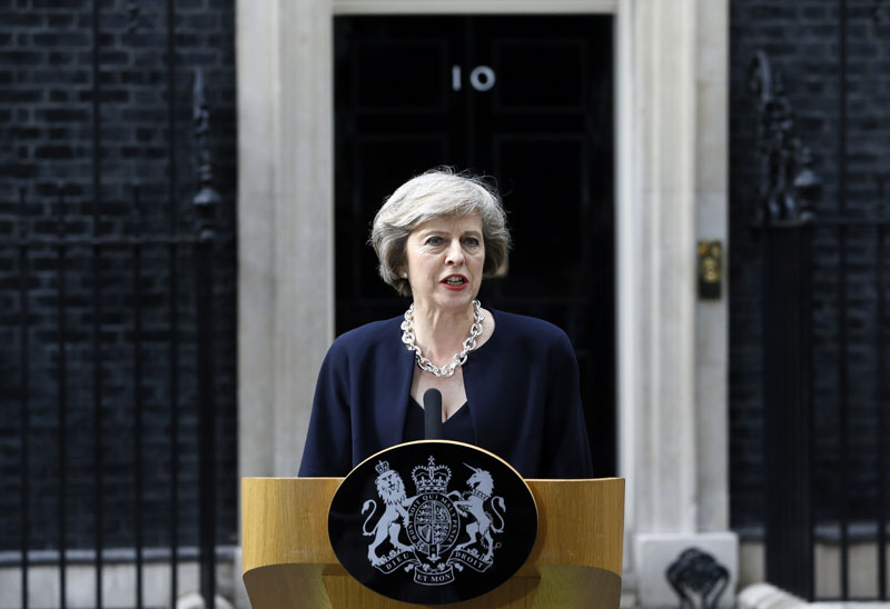New British Prime Minister Theresa May speaks to the media outside her official residence,10 Downing Street in London on Wednesday July 13, 2016. Photo: AP/File