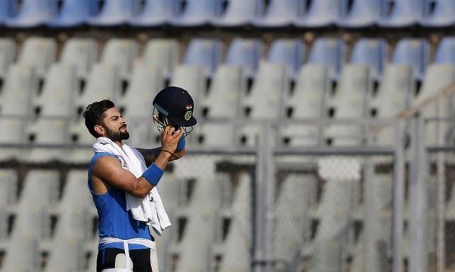 India's Virat Kohli prepares to bat in the nets. REUTERS/Danish Siddiqui