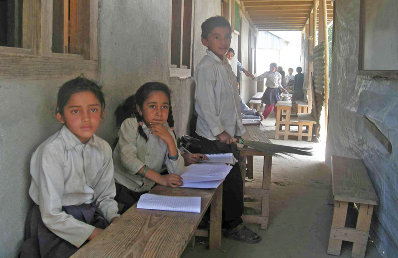 Students of Dobelabich Lower Secondary School taking class in the school balcony due to lack of classrooms, in Chiuridanda, Khotang, on Thursday, July 7, 2016. Photo: THT