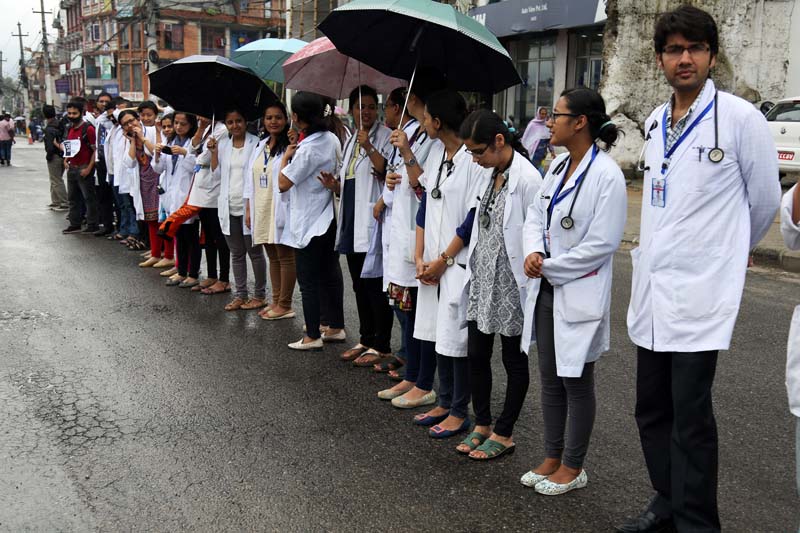 FILE: Resident doctors of Tribhuvan University Teaching Hospital protest against lawmakers' apathy toward demands of Dr Govinda KC in Baneshwor, Kathmandu on July 21, 2016. Photo: RSS
