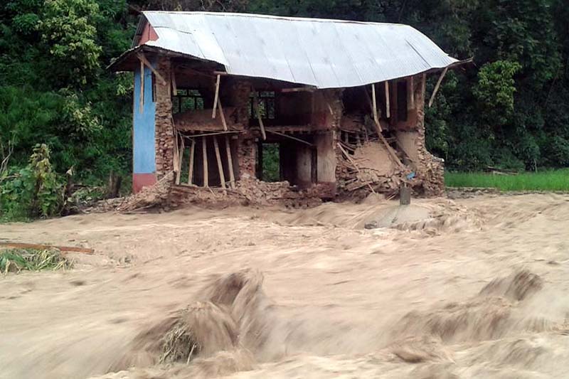 A house destroyed by the swollen Jumre River in Pyuthan Municipality, on Wednesday, July 27, 2016. Photo: THT