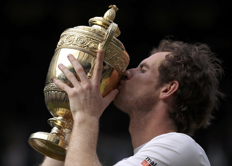 Great Britain's Andy Murray kisses the trophy. Photo: Reuters
