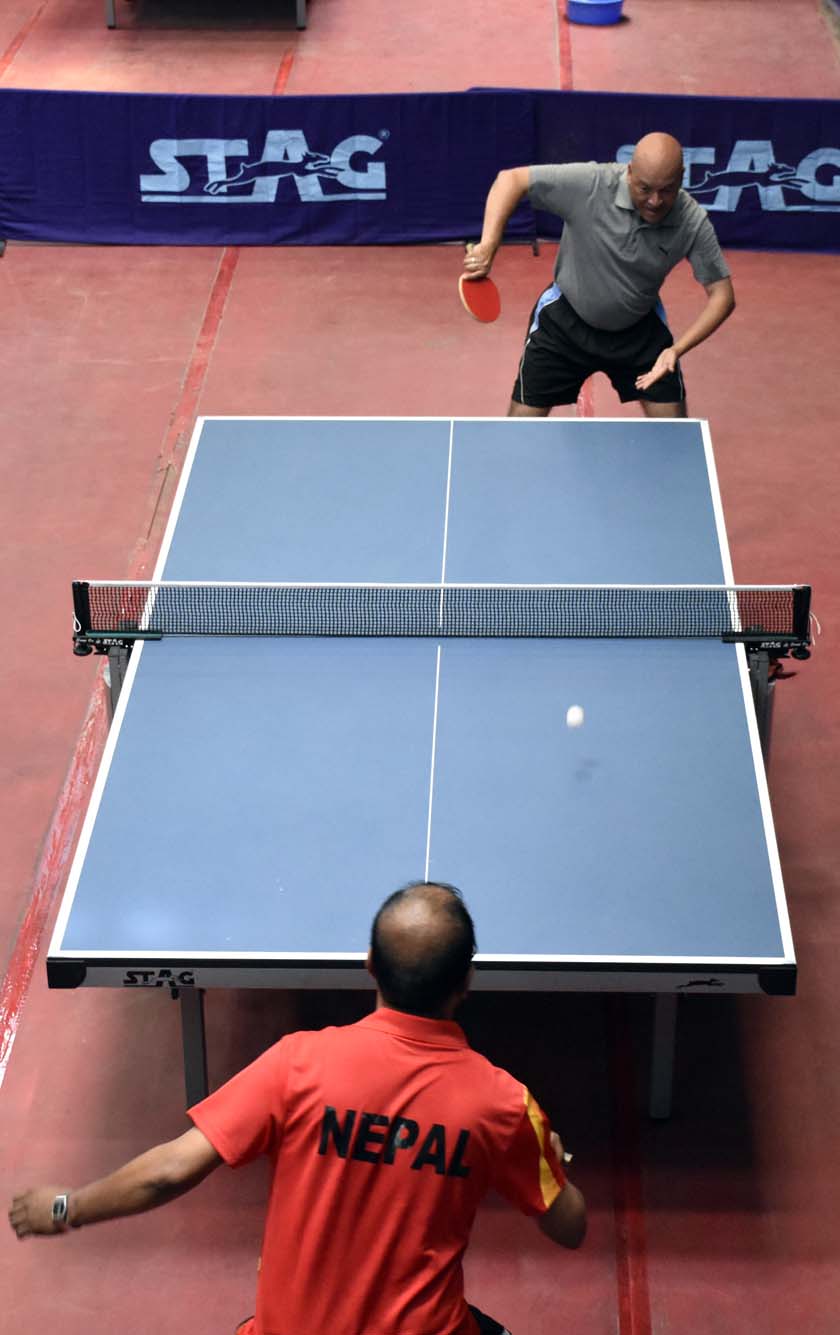 Action in the match between Nepal and India during the South Asian Veteran Table Tennis Tournament in Kathmandu on Sunday, July 24, 2016. Photo: THT