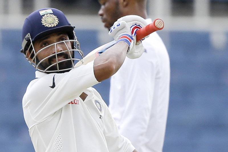 India's Ajinkya Rahane celebrates after he scored a century against West Indies during day three of their second cricket Test match at the Sabina Park Cricket Ground in Kingston, Jamaica, Monday, Aug. 1, 2016. Photo: AP
