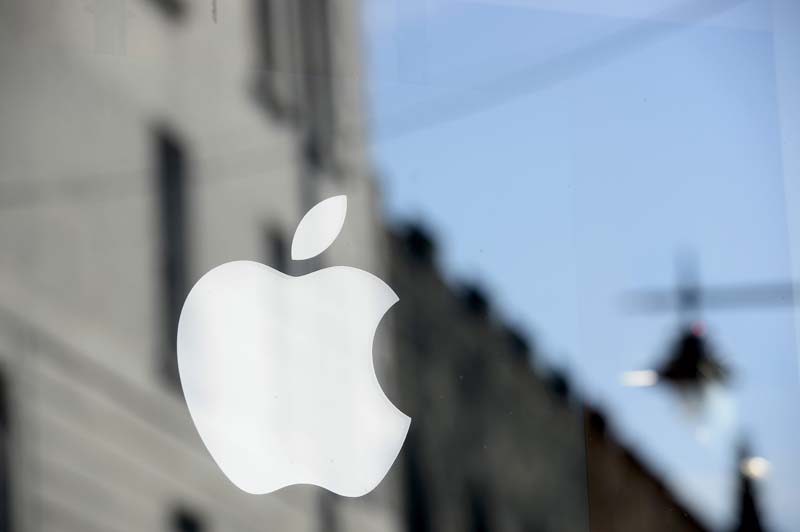 An Apple logo is seen in the window of an authorised apple reseller store in Galway, Ireland on August 30, 2016. Photo: Reuters