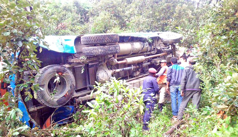 The wreckage of a bus that skidded off the road at Jyapu Bhir near Brindaban in Sidheshowri-3 of Baitidin district, on Monday, August 15, 2016. Photo: RSS