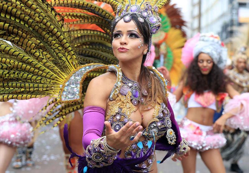 A reveler takes part in the Monday parade, during the second and final day of the Notting Hill Carnival, in London, Monday August 29, 2016.Photo: AP)