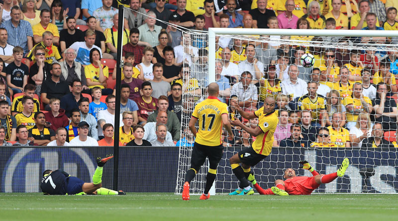 Arsenal's Alexis Sanchez, bottom left, scores his side's second goal during the English Premier League soccer match between Watford and Arsenal at Vicarage Road, Watford, England, on Saturday, August 27, 2016. Photo: Tim Goode/PA via AP