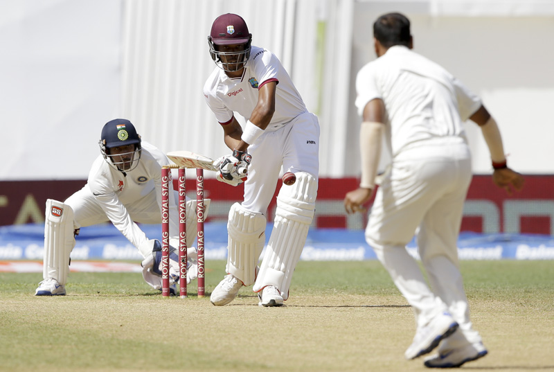 West Indies' batsman Roston Chase plays a shot from the bowling of India's Amit Mishra during day five of their second cricket Test match at the Sabina Park Cricket Ground in Kingston, Jamaica, Wednesday, Aug. 3, 2016. Photo: AP