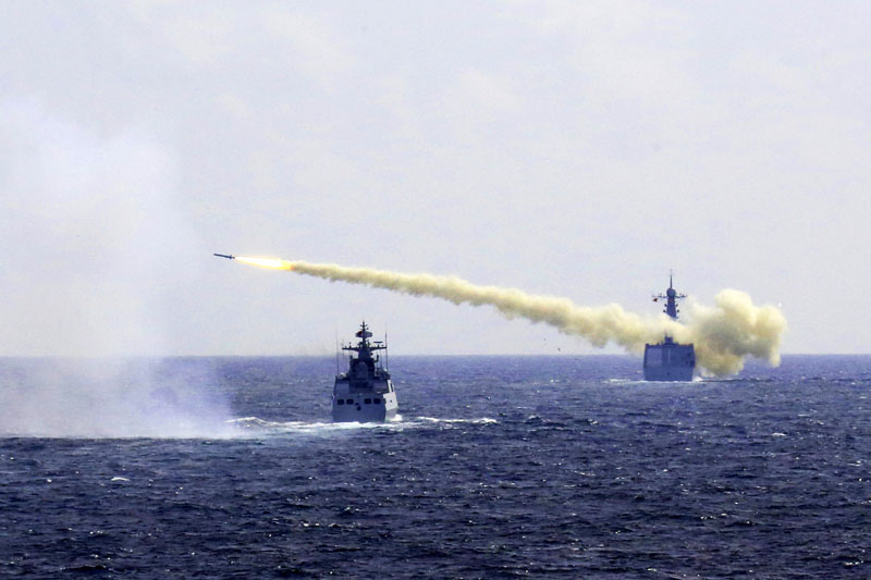 A missile is launched from a navy ship during a live ammunition drill in the East China Sea, on Monday, August 1, 2016.  Photo: Wu Dengfeng/Xinhua via AP