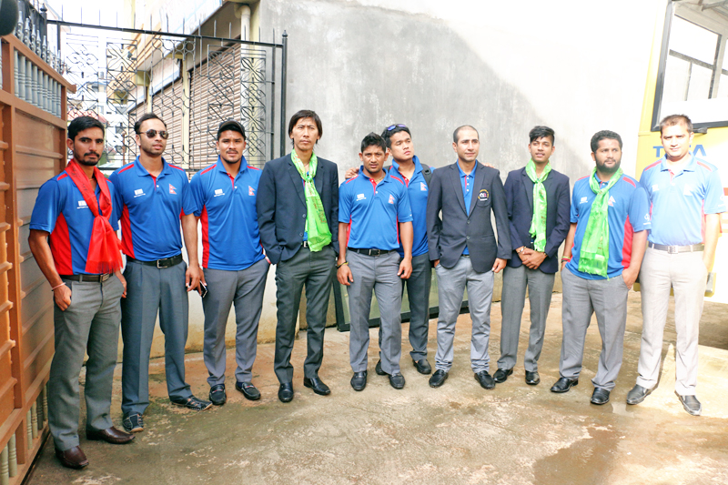 Nepal's cricket players pose for a group photo upon their arrival from the Netherlands, in Kathmandu on Friday, August 19, 2016. Nepal's national cricket team had left for Netherlands to participate in the ICC World Cricket League Championship. Photo: RSS