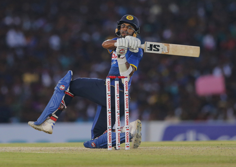 Sri Lanka's Dinesh Chandimal plays a shot against Australia during their third one day international cricket match in Dambulla, Sri Lanka, Sunday, August 28, 2016. Photo: AP