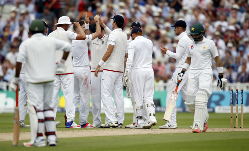 England's James Anderson celebrates with teammates after taking the wicket of Pakistan's Misbah-ul-Haqn during Third Test match at Edgbaston, on Friday, August 5, 2016. Photo: Reuters
