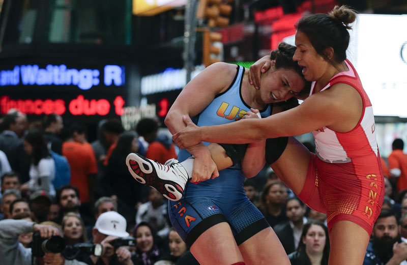 FILE - Adeline Gray (left) attempts to take down Canada's Justina Di Stasio during the Beat the Streets wrestling exhibition in Times Square in New York, on May 19, 2016. Gray is ranked No. 1 at 75 kilograms (165 pounds) and will attempt to win the first gold for US women's wrestling on August 18 at the Olympics in Rio. Photo: AP