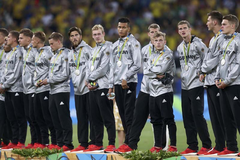 Players of team Germany react during the medal ceremony after losing Men's Football Final to Brazil at the Maracana Stadium in Rio de Janeiro, Brazil on Saturday, August 20, 2016. Photo: Reuters