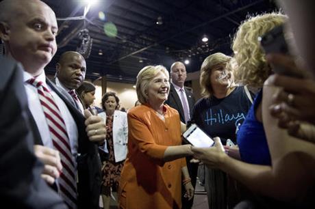 Democratic presidential candidate Hillary Clinton greets members of the audience after speaking at a rally at Osceola Heritage Park, in Kissimmee, Fla., Monday, Aug. 8, 2016.
