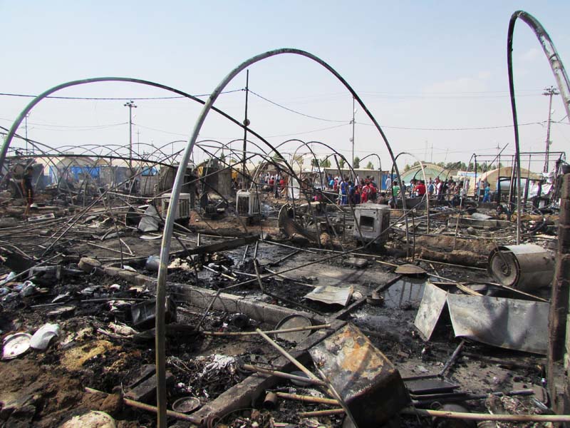 Tents that were destroyed by fire are seen at Yahayawa refugee camp near Kirkuk, Iraq, on August 29, 2016. Photo: Reuters