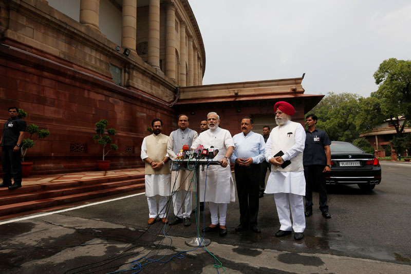 India's Prime Minister Narendra Modi (centre) speaks to the media inside the parliament premises on the first day of the monsoon session in New Delhi, India, on July 18, 2016. Photo: Reuters