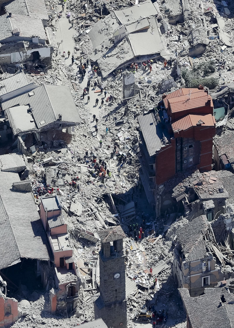 Rescuers search amid rubble following an earthquake in Amatrice Italy on Wednesday, August 24, 2016. The magnitude 6 quake struck at 3:36 am (0136 GMT) and was felt across a broad swath of central Italy, including Rome where residents of the capital felt a long swaying followed by aftershocks. Photo:AP