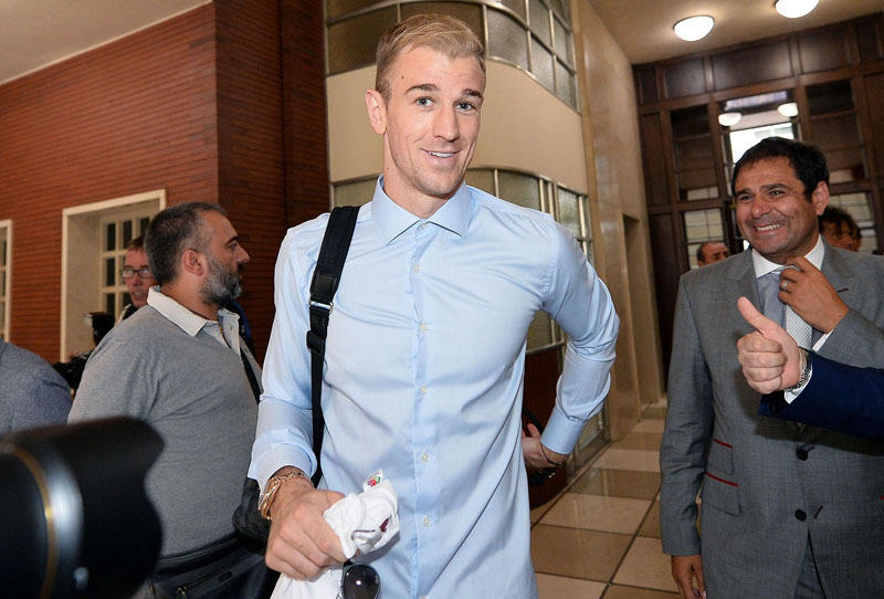 Goalkeeper Joe Hart smiles upon his arrival at the Torino soccer team headquarters in Turin, Italy, on Tuesday, August 30, 2016. Photo: Alessandro Di Marco/ANSA via AP
