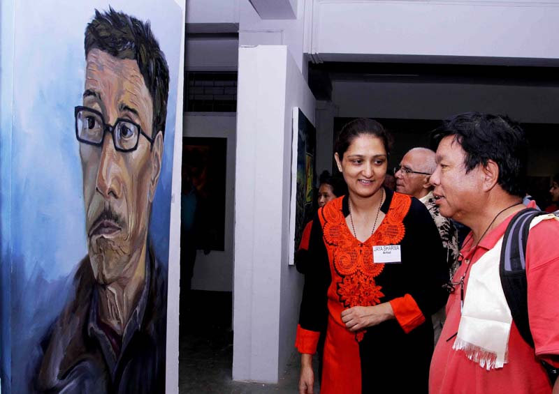 Activist Mahabir Pun, along with artist Jaya Sharma, observes an art exhibition at the Nepal Art Council, in August 2016. Photo: Subrat Acharya