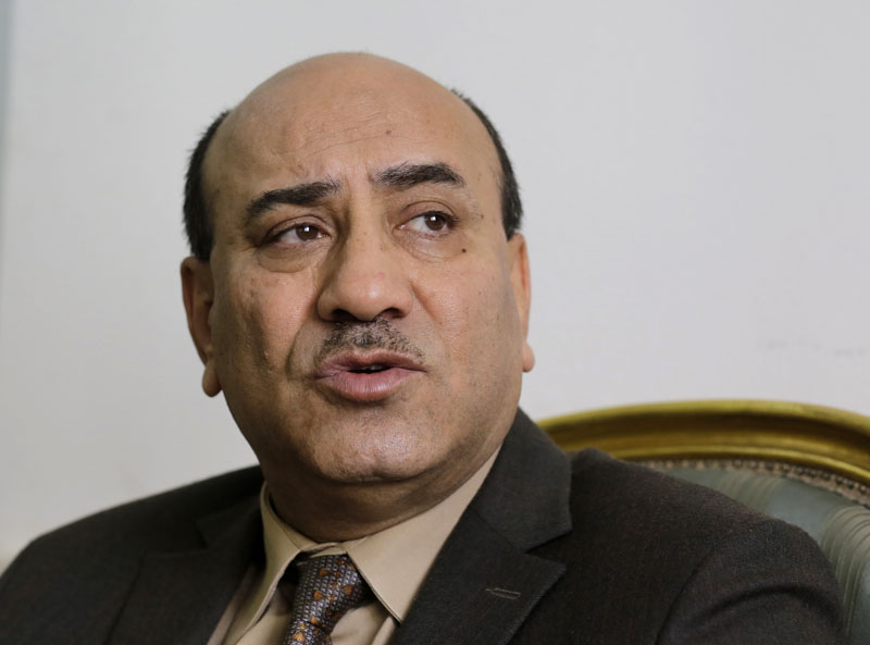 FILE - In this  April 16, 2014 file photo, Hesham Genena, then head of Egypt's oversight body, speaks during an interview with the Associated Press at his office in Cairo. Photo: AP