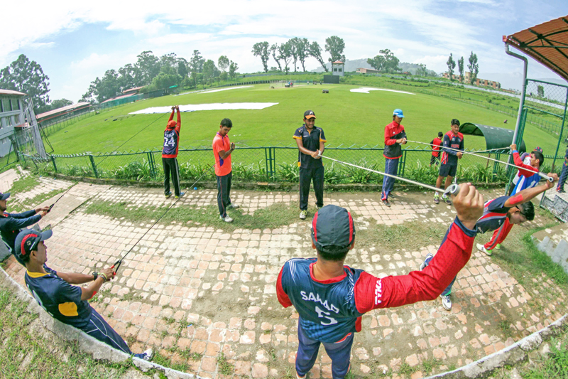 Nepal national cricket team members take part in training at the TU Stadium in Kathmandu on Monday, August 1, 2016. Nepal are preparing for the ICC World Cricket League Championship matches against the Netherlands slated for August 13 and 15 in Amstelveen. Photo: THT