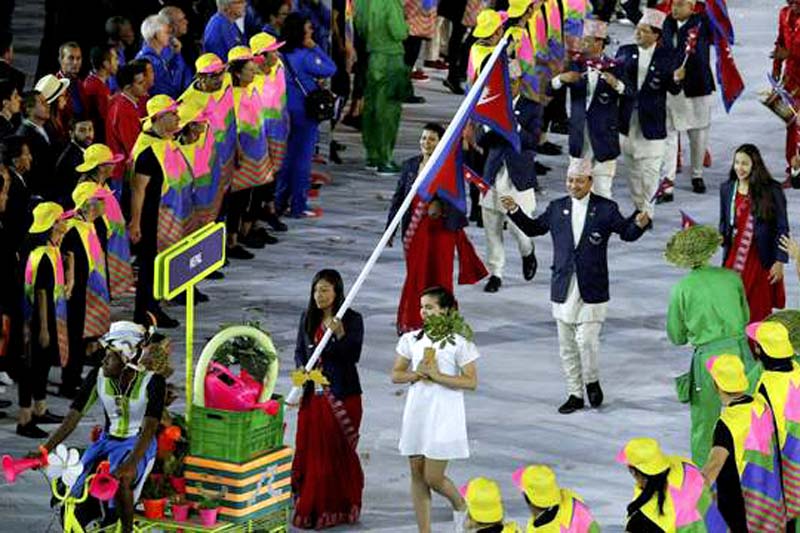 Judoka Phupu Lhamu Khatri leads the Nepali contingent into the stadium during the Opening ceremony of the Rio Olympics 2016, in Maracana, Rio de Janeiro on August 6, 2016. Photo: Reuters