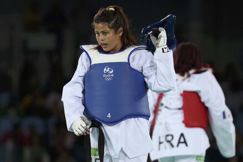Nisha Rawal of Nepal reacts after losing to Gwladys Epangue of France in Women's +67kg Repechage at the Carioca Arena 3 in Rio de Janeiro, Brazil on August 20, 2016. Photo: Reuters