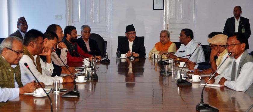 Prime Minister Pushpa Kamal Dahal (C) in presence of his coalition ally Nepali Congress President Sher Bahadur Deuba (right to him) holds talks with top leaders of Madhesi parties in Singhadarbar on Friday, August 5, 2016.Photo: RSS