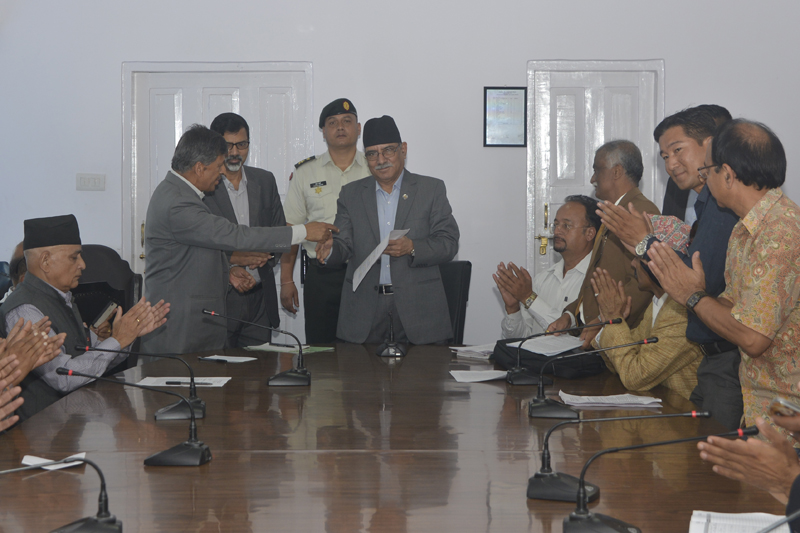 Prime Minister Pushpa Kamal Dahal receives a memorandum from the National Concern Campaign, in Kathmandu, on Monday, August 29, 2016. Photo: RSS