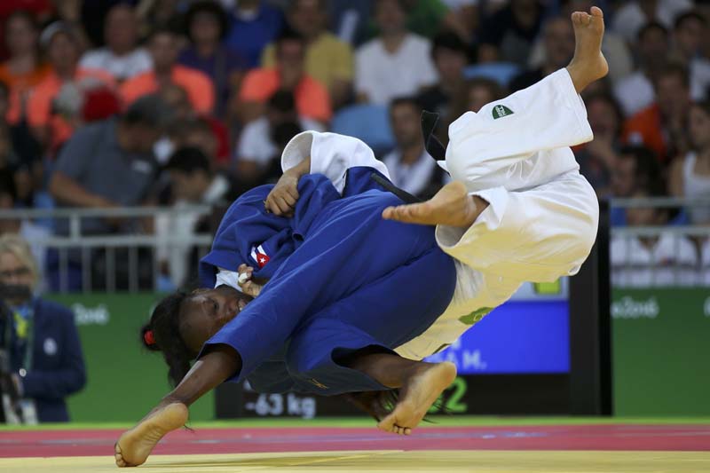 Phupu Lhamu Khatri (NEP) of Nepal and Maricet Espinosa (CUB) of Cuba compete in the Women's 63kg Elimination Rounds of Rio Olympics 2016 at Carioca Arena 2 in Rio de Janeiro on August 9, 2016. Photo: Reuters