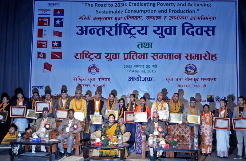 President Bidya Devi Bhandari with winners of the National Youth Award 2016 amid a programme organised by the National Youth Council on the occasion of International Youth Day, in Kathmandu, on Friday, August 12, 2016. Photo: RSS