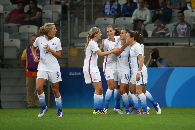 United States' players celebrates after their teammate Carli Lloyd, second right, scored against New Zealand during a Women's Olympic Football Tournament match at the Mineirao stadium in Belo Horizonte, Brazil, on Wednesday, August 3, 2016. Photo: AP