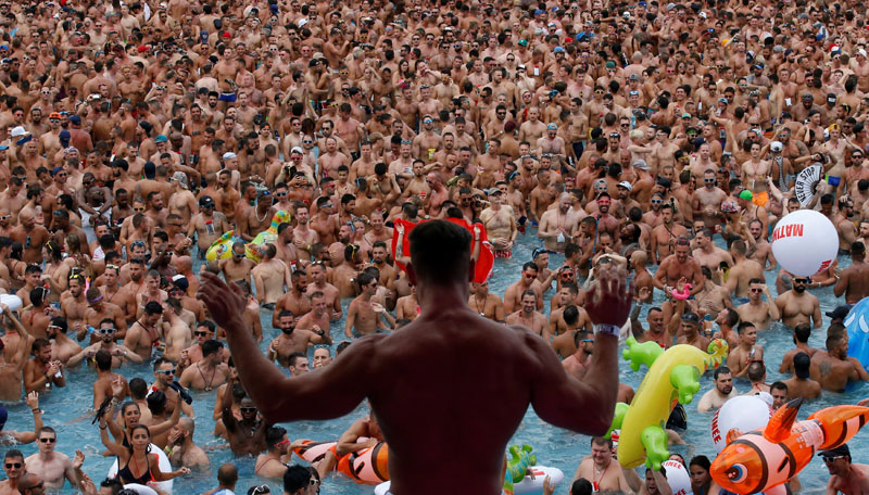 People dance at a pool party during the gay and lesbian Circuit Festival in Vilassar de Dalt, near Barcelona, Spain, August 9, 2016. Photo: REUTERS