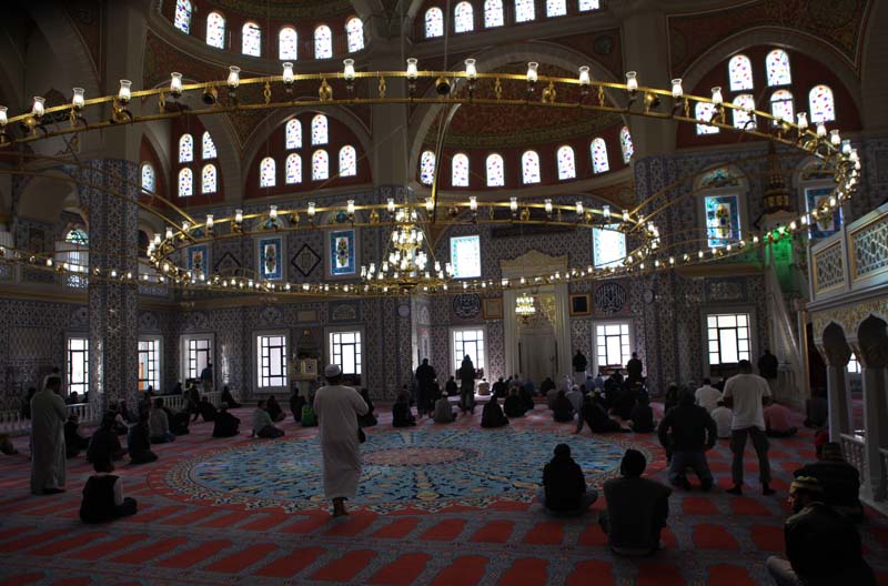 File- Worshippers gather at the Nizamiye Mosque,a soaring structure built with the funds of a Gulen backer, for prayers after celebrating Eid in Midrand, north of Johannesburg, South Africa, in August 2014. Photo: AP