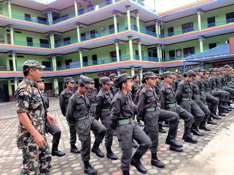 Students attending Nepali Armyu0092s junior division training at Bhagawati Higher nSecondary School, in Sindhuli, on Saturday.