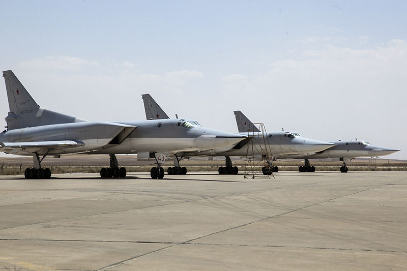 A Russian Tu-22M3 bomber stands on the tarmac at an air base near Hamedan, Iran,  on Monday, August, 2016. Photo: WarfareWW Photo via AP