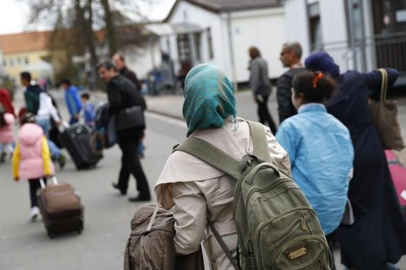 File - Syrian refugees arrive at the camp for refugees and migrants in Friedland, Germany, on April 4, 2016. Photo: Reuters