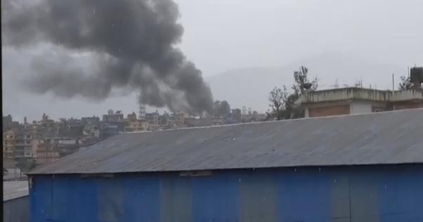 This photograph grabbed from a video posted on YouTube shows black smoke billowing over the Nepal Electricity Authority's substation at Syuchatara. 