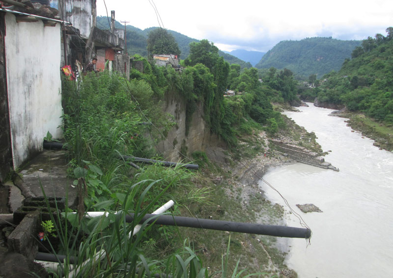 Bhimad Bazaar, which is at high risk of landslide after the Seti River eroded the area, in Tanahun, on Tuesday, August 2, 2016. Photo: THT