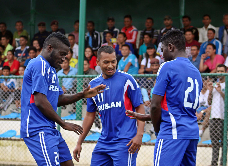 Three Star Club players celebrate after scoring a goal against Tribhuvan Army Club during their friendly match at the ANFA Complex grounds in Lalitpur on Sunday, August 7, 2016. Photo: THT