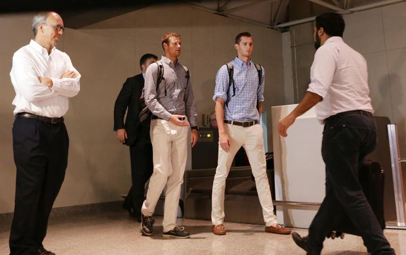 US Olympic swimmers Jack Conger and Gunnar Bentz check in at the international airport to board a flight back to the US after spending the day being interrogated by police in Rio de Janeiro, on August 18, 2016. Photo: Reuters