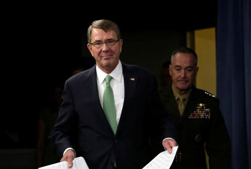 US Secretary of Defense Ash Carter (front) and Chairman of the Joint Chiefs of Staff General Joseph F Dunford arrive at a joint news conference at the Pentagon in Washington, US July 25, 2016. Photo: Reuters