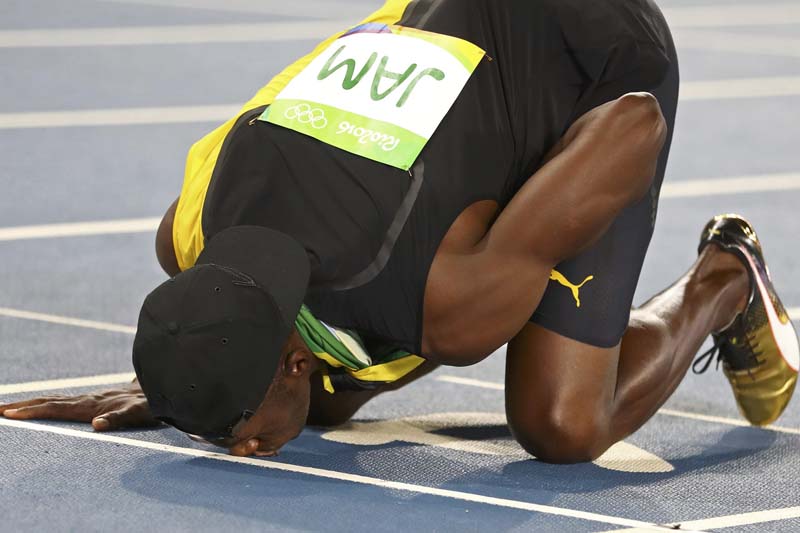 Usain Bolt of Jamaica celebrates winning the gold medal for Jamaican team in Men's 4 x 100m Relay Final at the Olympic Stadium in Rio de Janeiro, Brazil on August 19, 2016. Photo: Reuters
